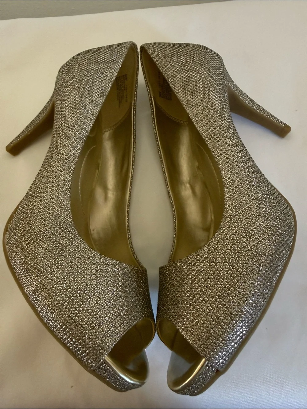 Bandolino Silver Glitter Peep-Toe Stiletto Heels, available in size 9 wide.